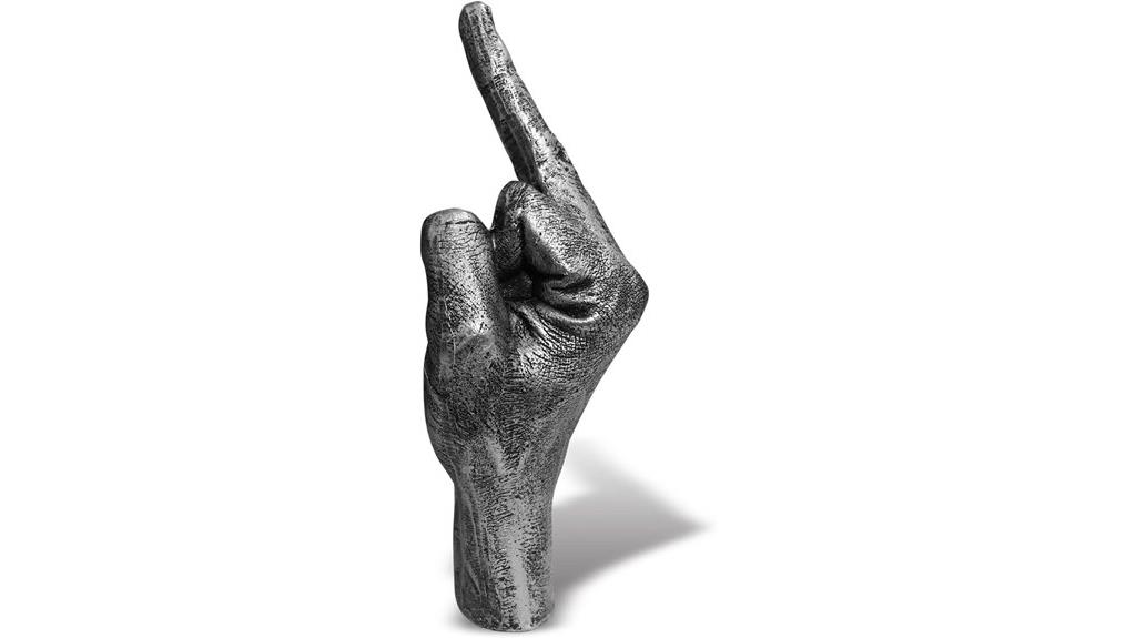 silver hand gesture sculpture